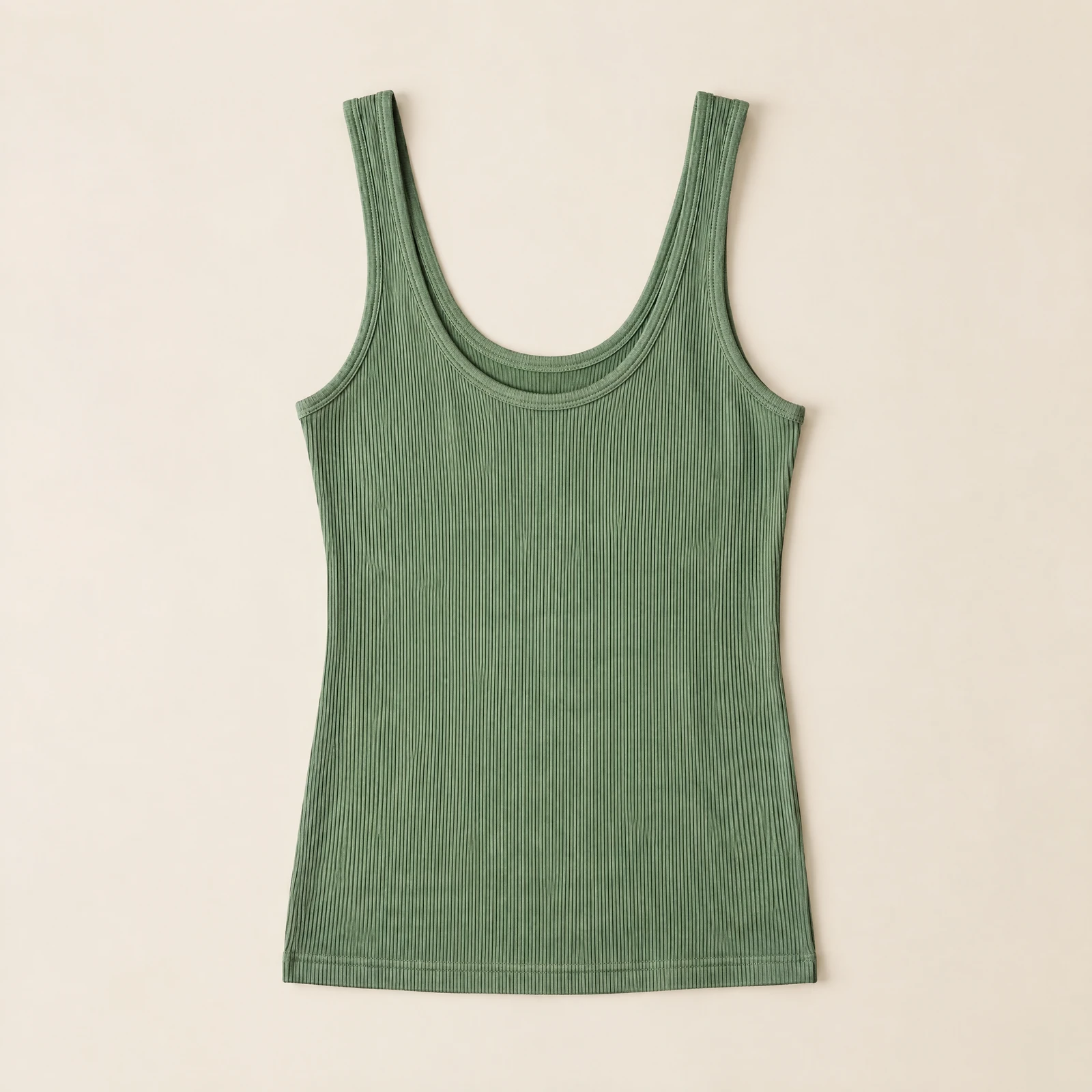 Sage green ribbed tank top with scoop neckline laid flat